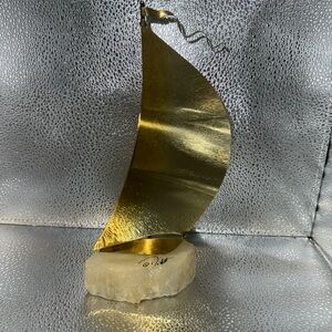 Vintage John Demott Signed Metal
Brass Nautical Sailboat Sculpture
Onyx Base 9"